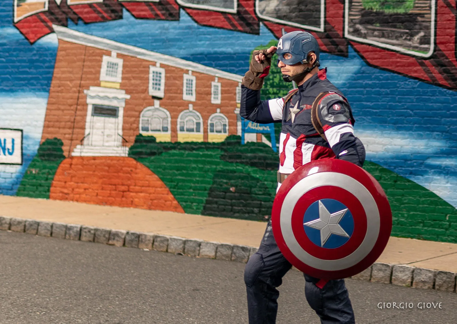 Captain America posing with shield