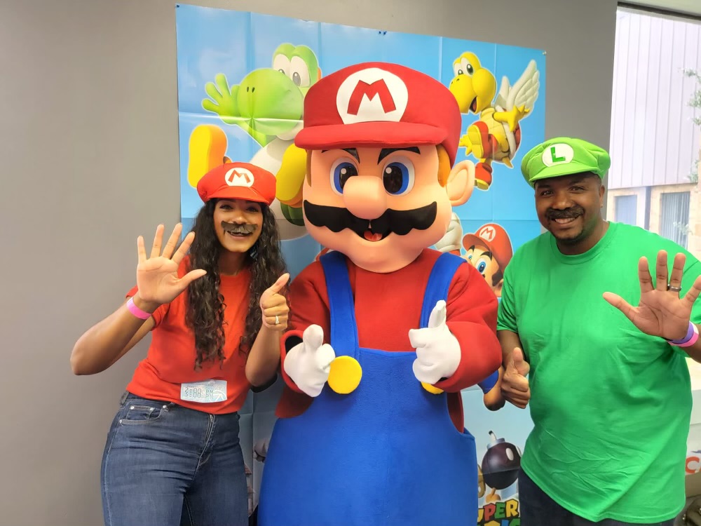 Mario with two adults in costume doing two thumbs up | Rent Party Characters