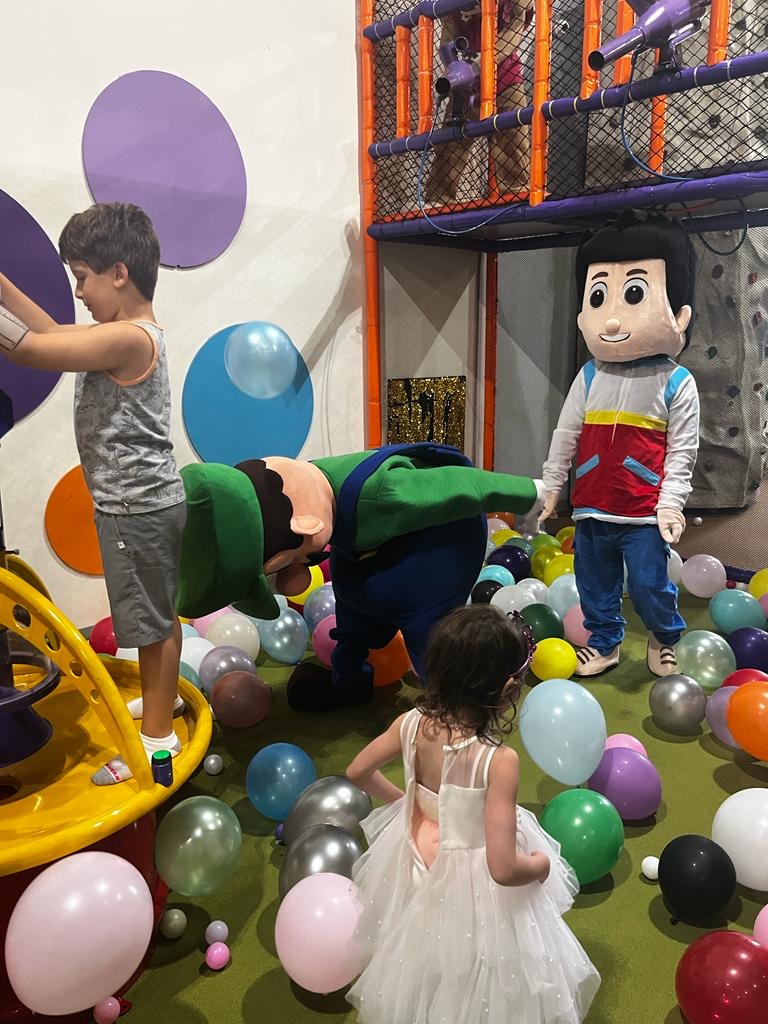 Ryder from Paw Patrol with children and balloons | Rent Party Characters