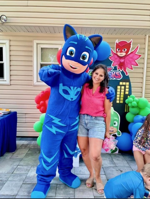 PJ Masks Catboy hugging a lady surrounded by balloons | Rent Party Characters