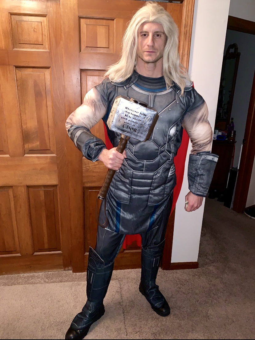Thor posing with his hammer | Rent Party Characters