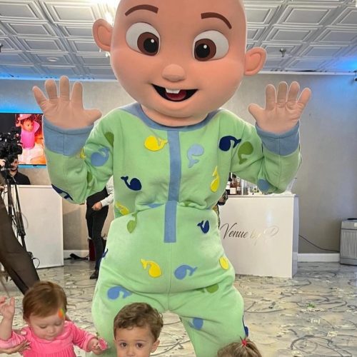 JJ from Cocomelon surrounded by children with his hands up | Rent Party Characters